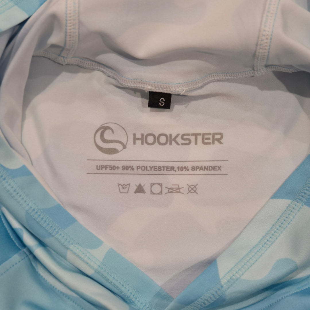 Inside neck label of the Aqua Recon UPF 50+ UV hoodie: UPF 50+, 90% polyester, 10% spandex