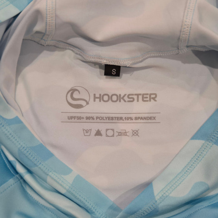 Inside neck label of the Aqua Recon UPF 50+ UV hoodie: UPF 50+, 90% polyester, 10% spandex