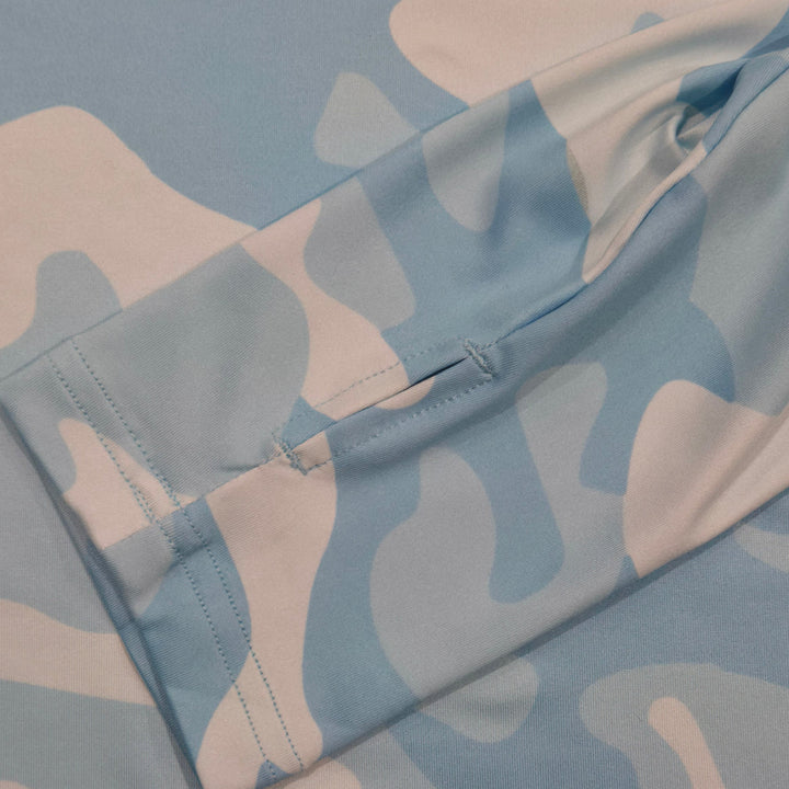 Thumbhole cuff on the Aqua Recon UPF 50+ UV hoodie in light blue and white camo