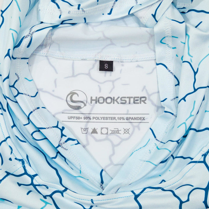 Inside neck label of the Reef Fade UPF 50+ UV hoodie: UPF 50+, 90% polyester, 10% spandex