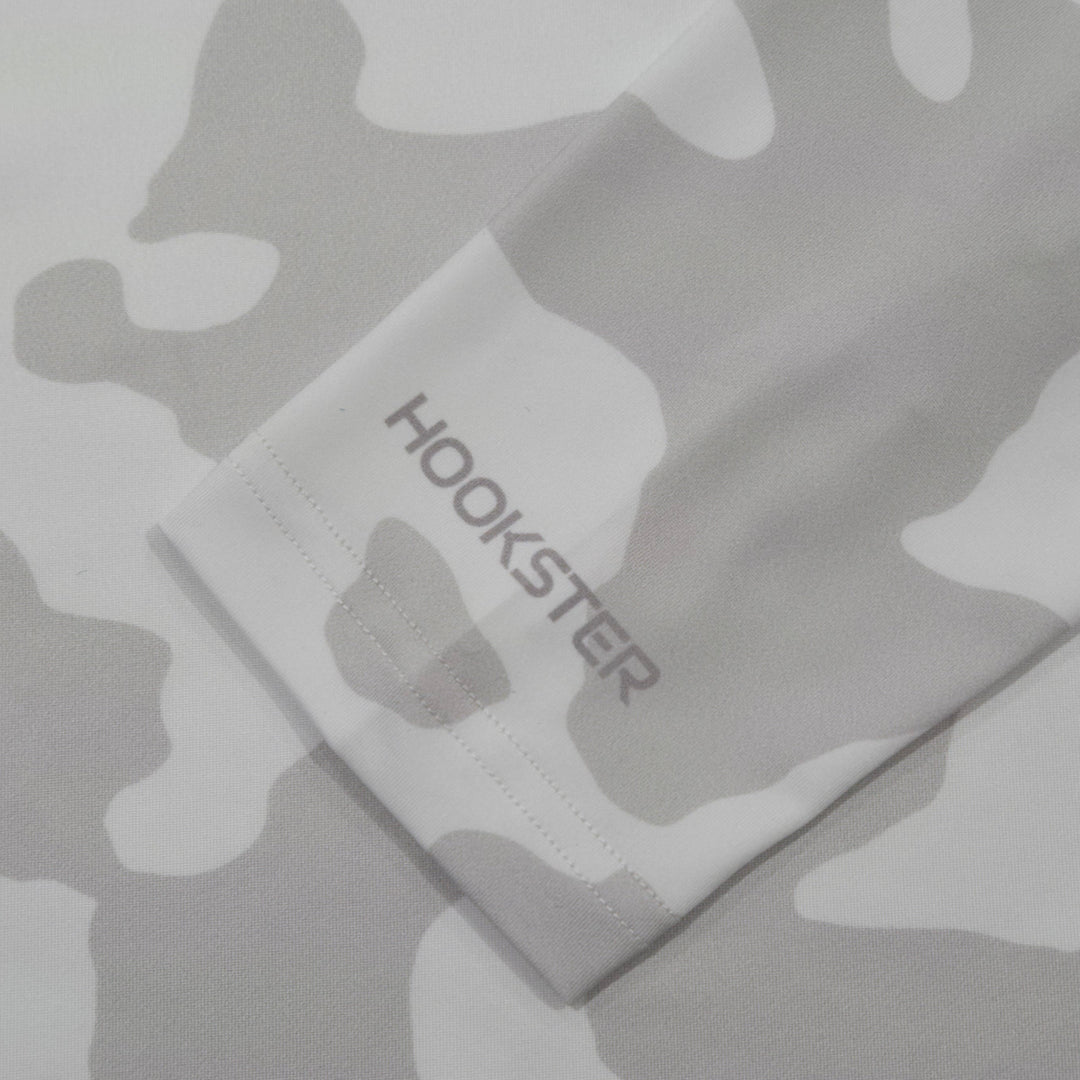 HOOKSTER logo on the sleeve cuff of the Shadow Camo UPF 50+ UV hoodie