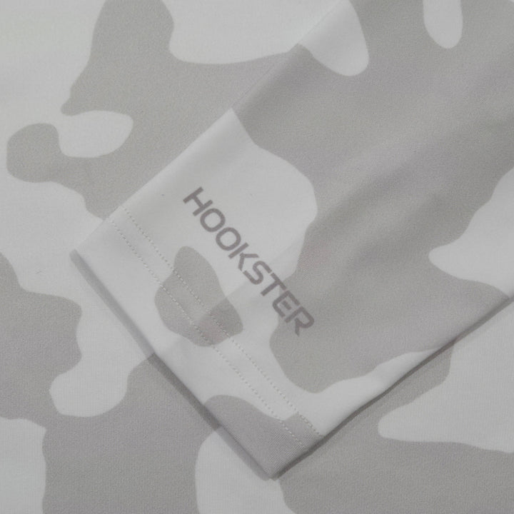 HOOKSTER logo on the sleeve cuff of the Shadow Camo UPF 50+ UV hoodie